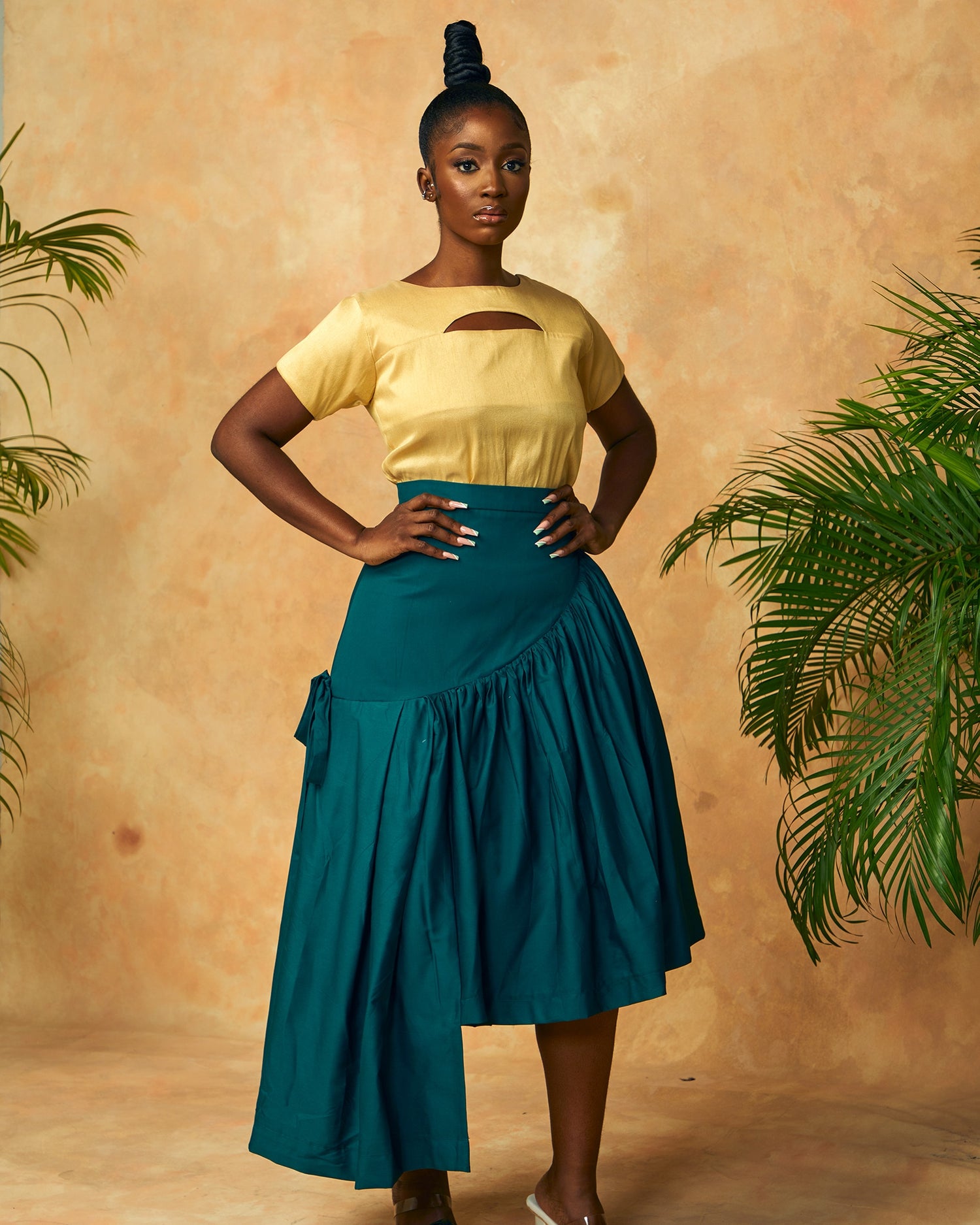 Asymmetrical Pleated Skirt with a hip curve and tie rope